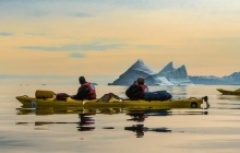Sea kayaking with icebergs in Greenland