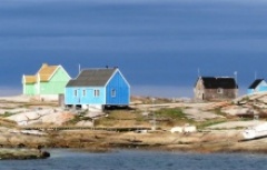 Coloured houses of Oqaatsut Rhode Bay Greenland